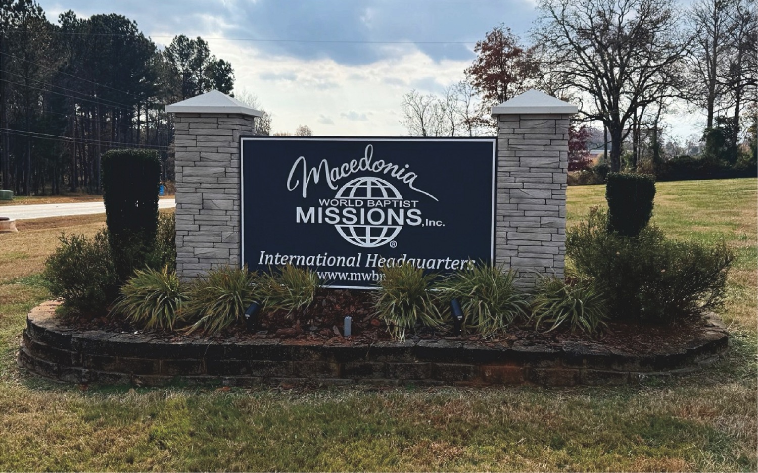Blue cloudy sky over grassy land