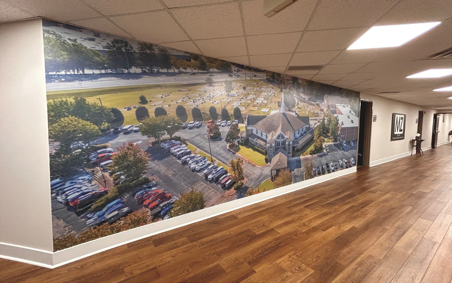 Wooden structure holds art painting